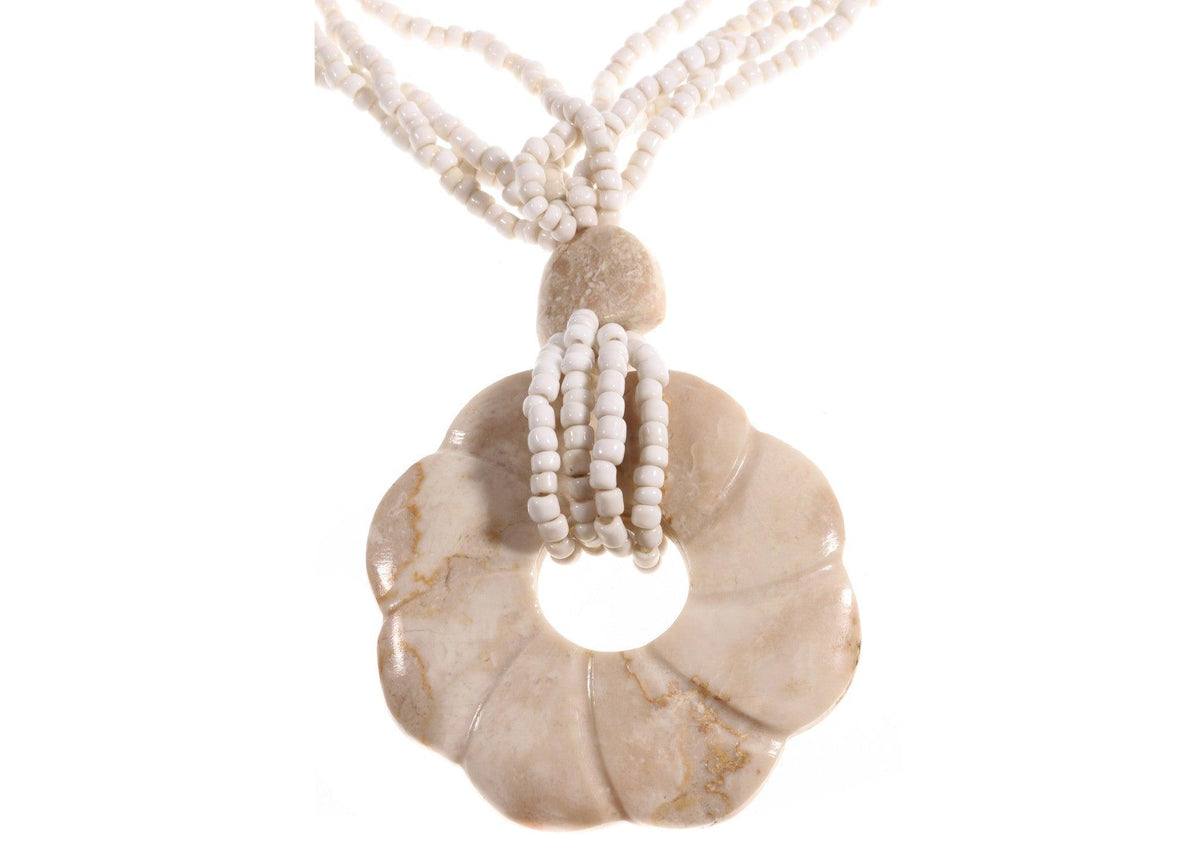 Cream beaded necklace with flower pendant  detail