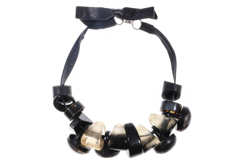 Necklace with faux leather and plastic 