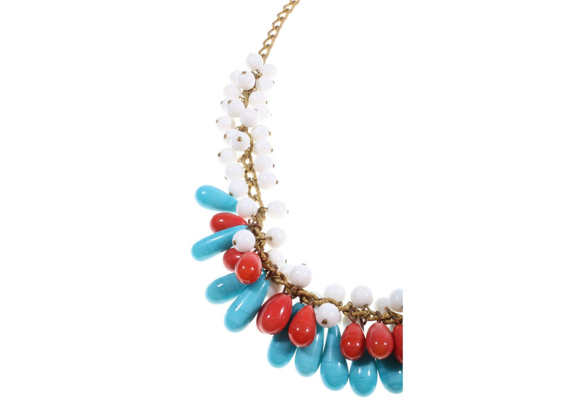 Blue and red beaded necklace detail