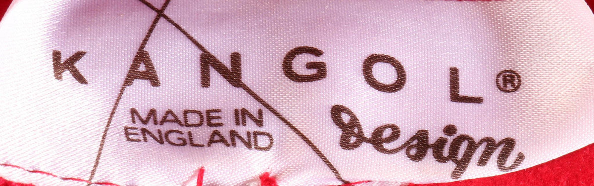 Kangol red hat with gold chain label