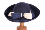 Eileene Model Millinery blue formal hat with large bow detail detail