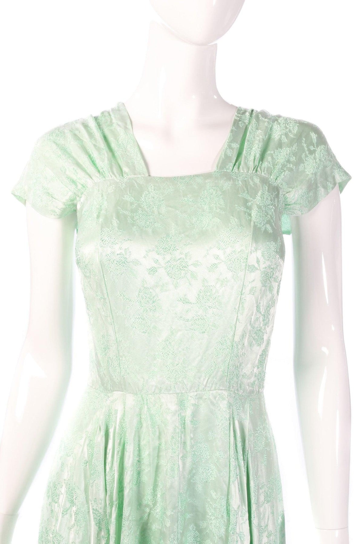 Light green floral evening dress detail