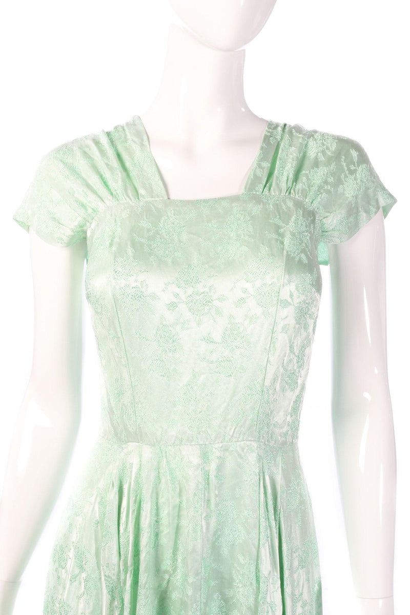 Light green floral evening dress detail