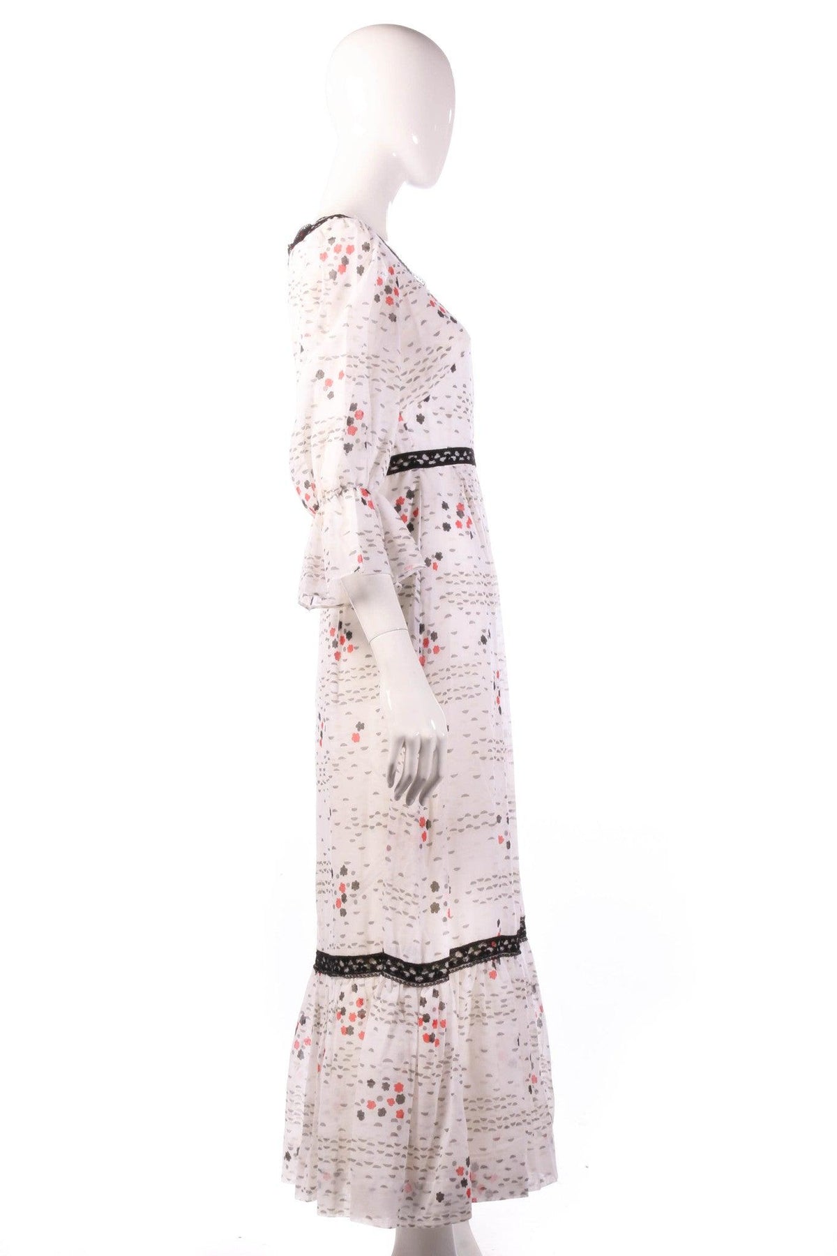 White floral dress with black lace detail side