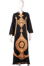 Black dress with gold motif