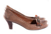 Brown leather shoes with toggle detail on the toe side