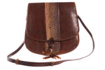 Brown leather handbag with tassel front 