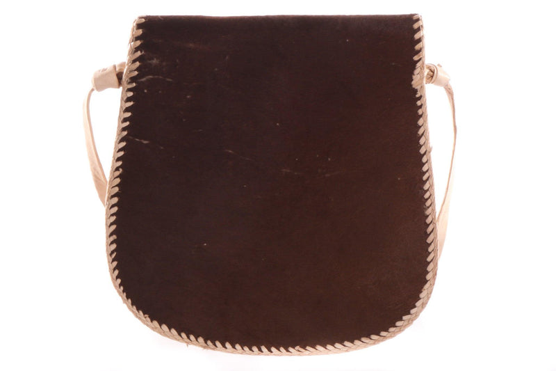 Small dark brown handbag with tassel  back