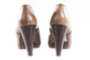 Brown leather heeled booties back