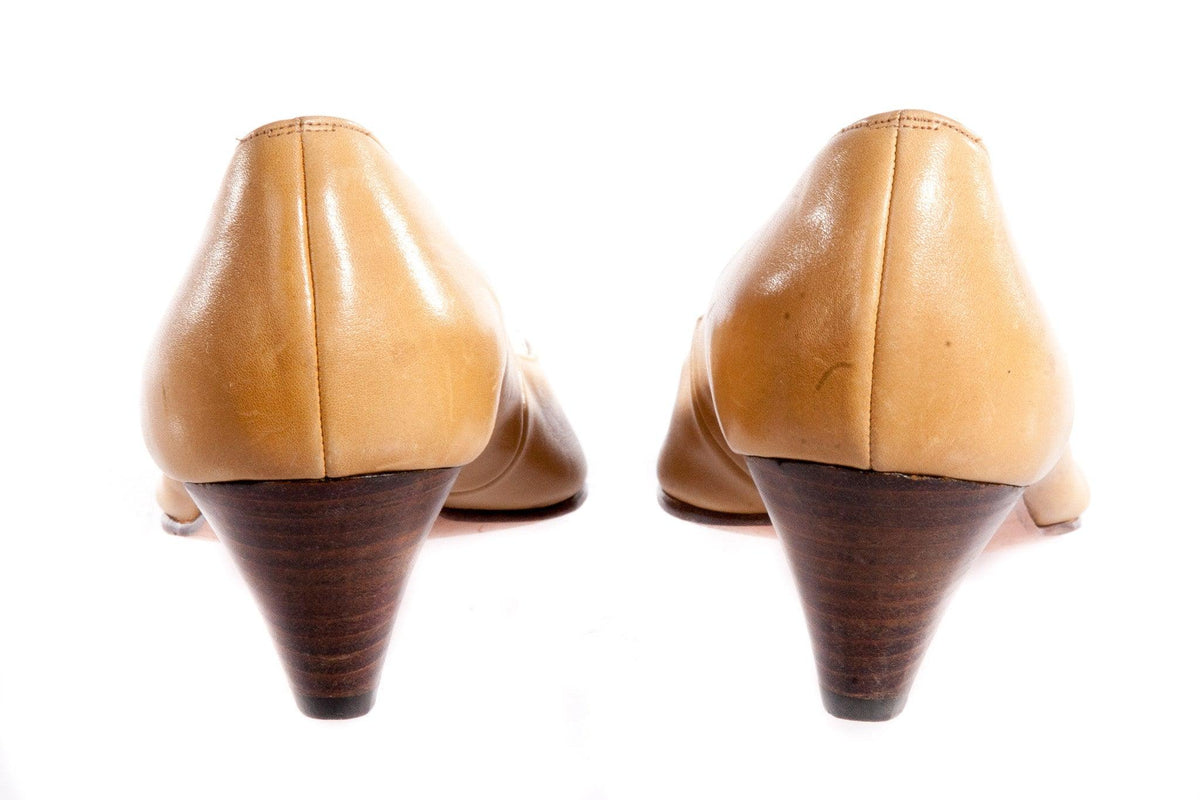 Brown leather shoes with white toe  back