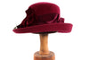 Whiteley deep red hat with flower 