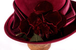 Whiteley deep red hat with flower 