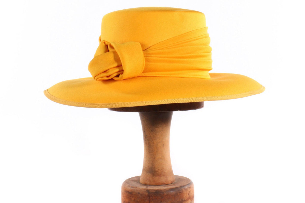Kangol yellow hat with knot detail 