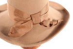 Beige hat with bow detail side