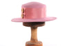 Light pink hat with button detail 