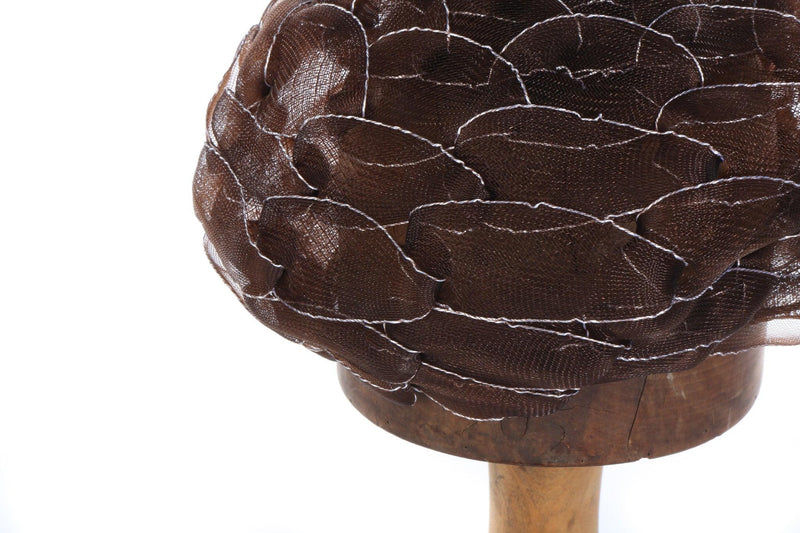 Brown net hat with silver details 