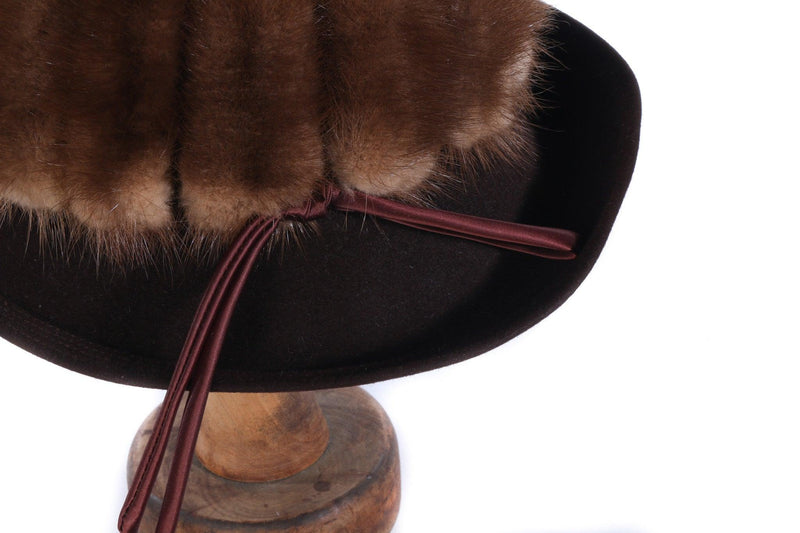 Dark brown hat with fur detail
