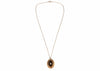Sphinx gold tone necklace with black pendant and pearl centre - Ava & Iva