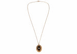 Sphinx gold tone necklace with black pendant and pearl centre - Ava & Iva