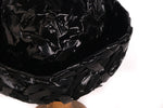 Black woven plastic hat  detail