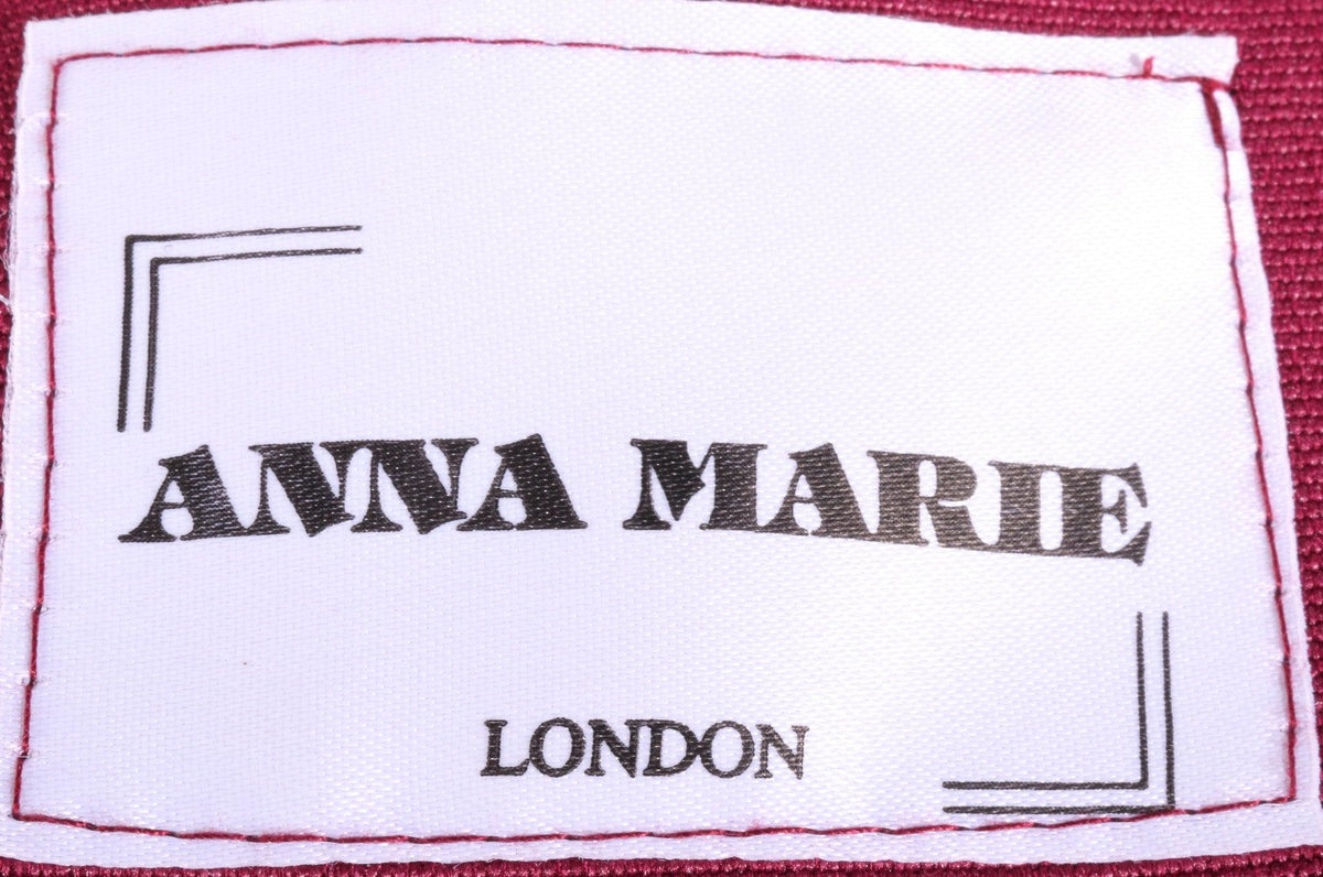 Anna Marie pink jacket with red and black stripes label