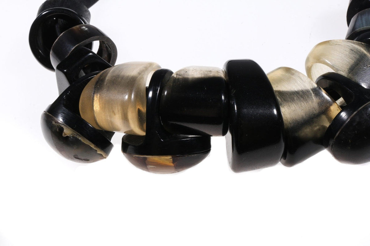 Necklace with faux leather and plastic detail