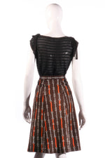Brown skirt with chain print back