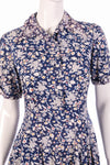White and blue floral button up dress with collar detail