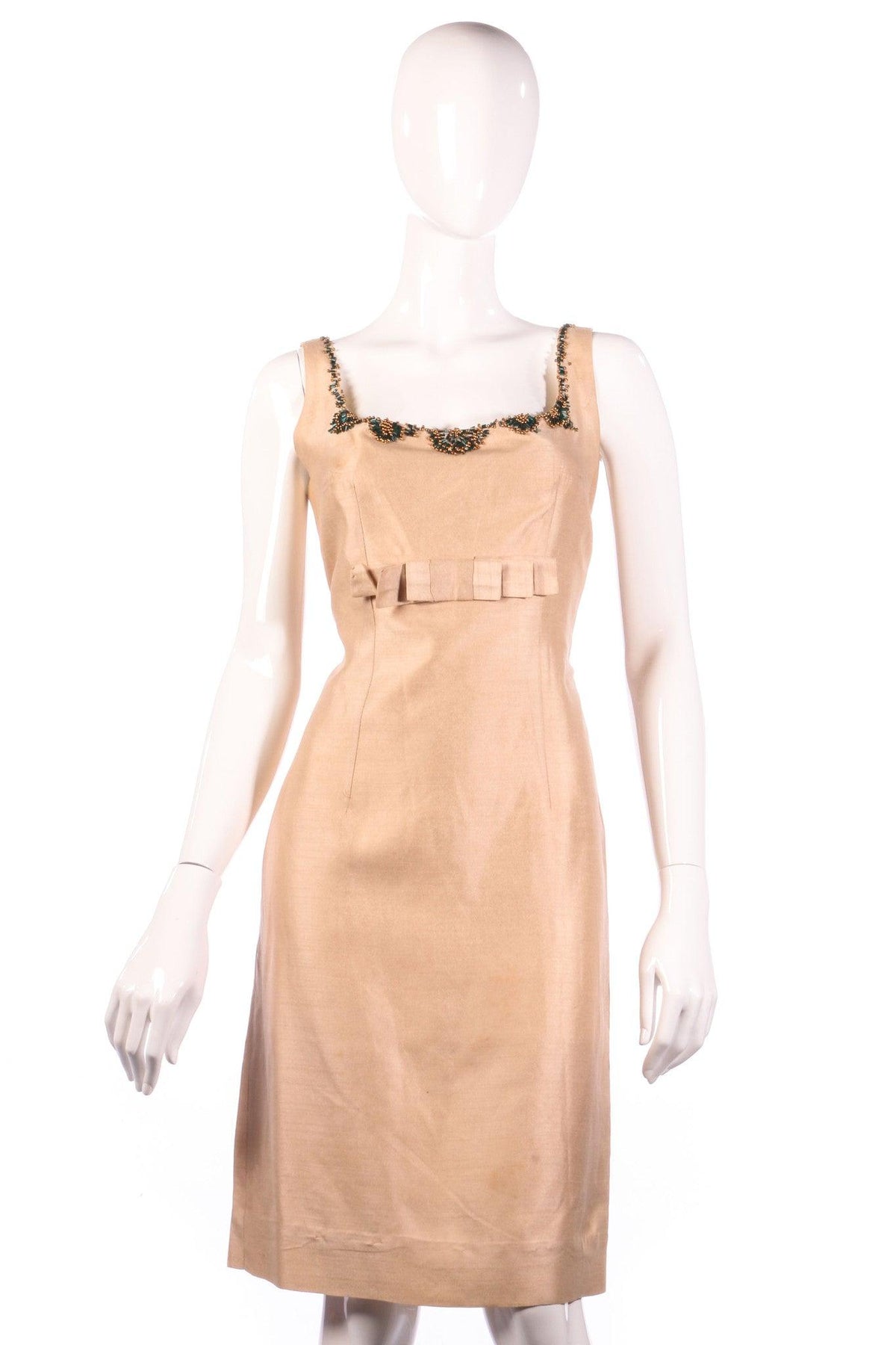 Beige cocktail dress with beaded neckline