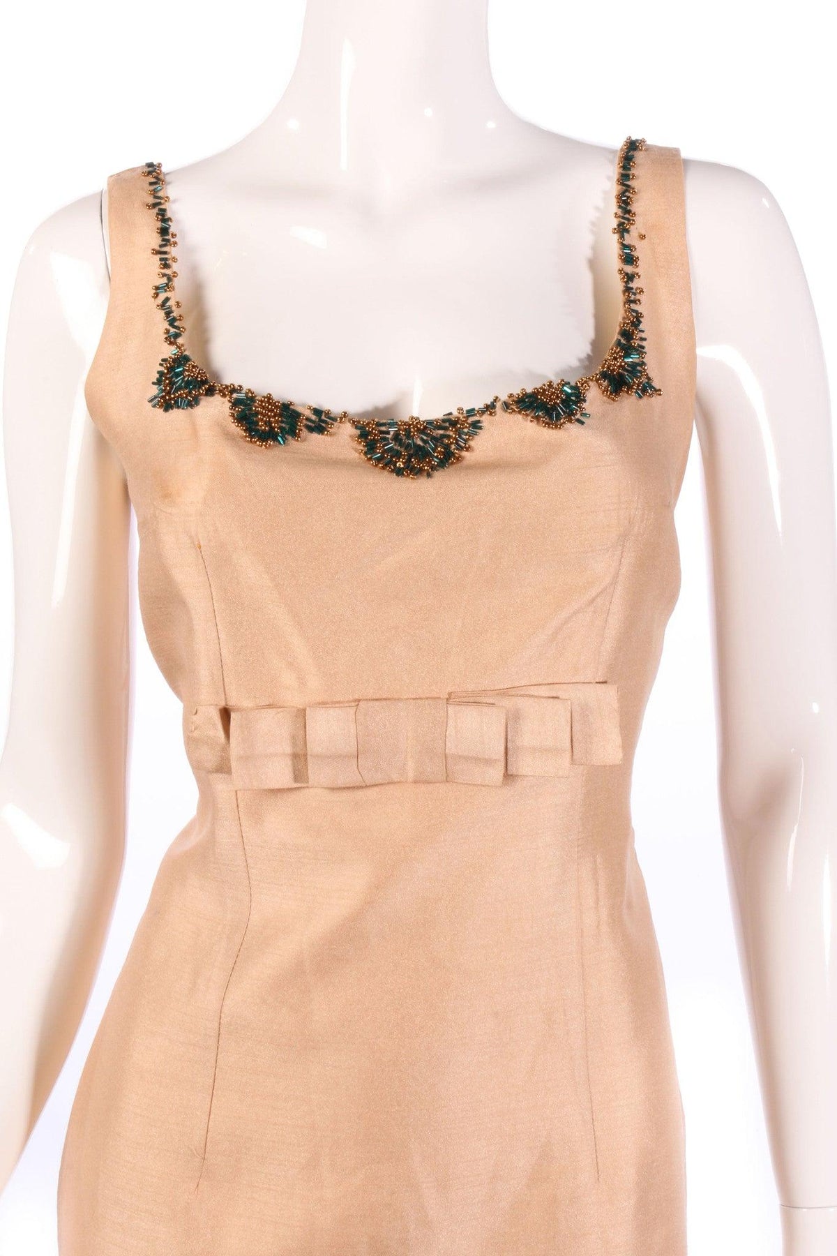 Beige cocktail dress with beaded neckline  detail